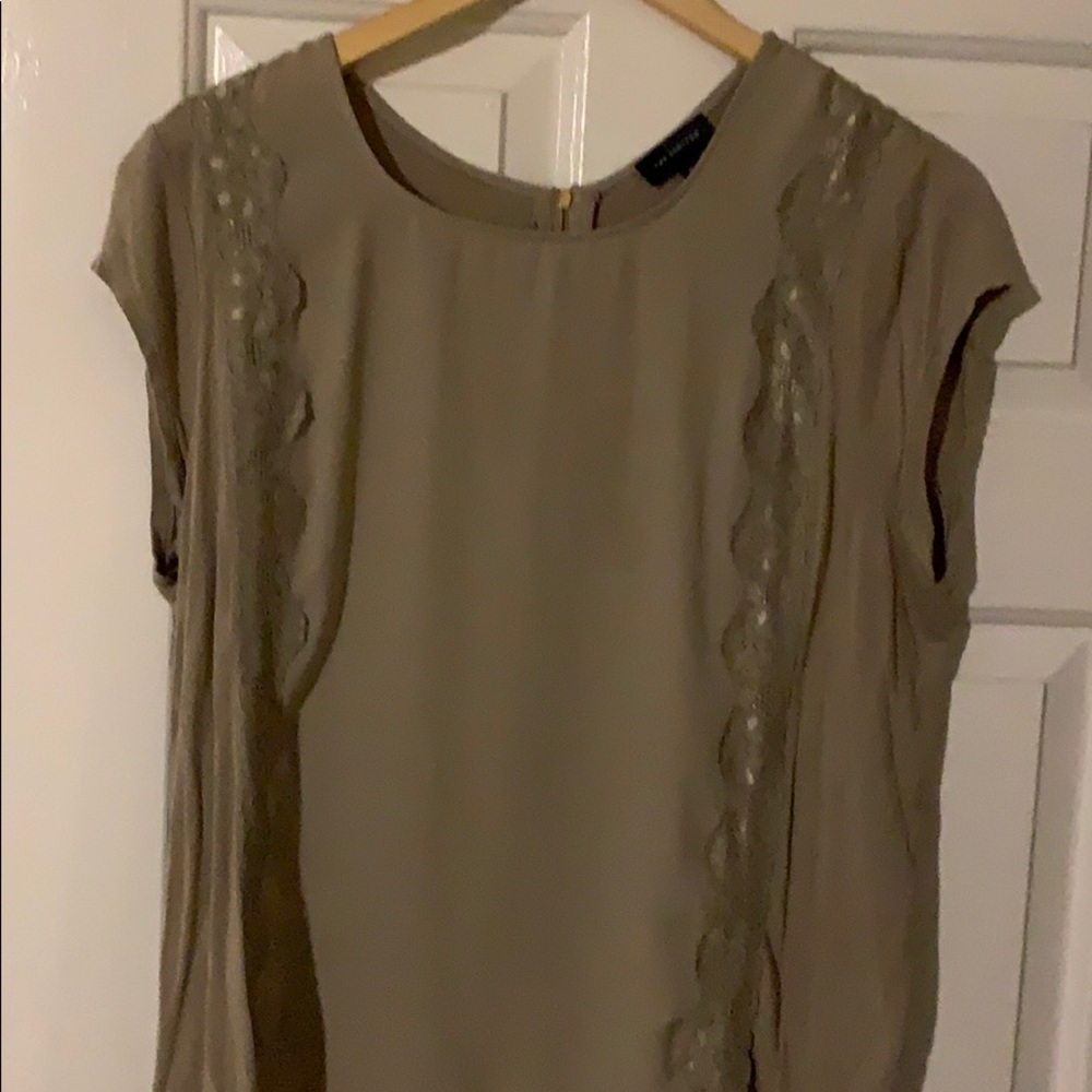 Limited tan/green blouse.